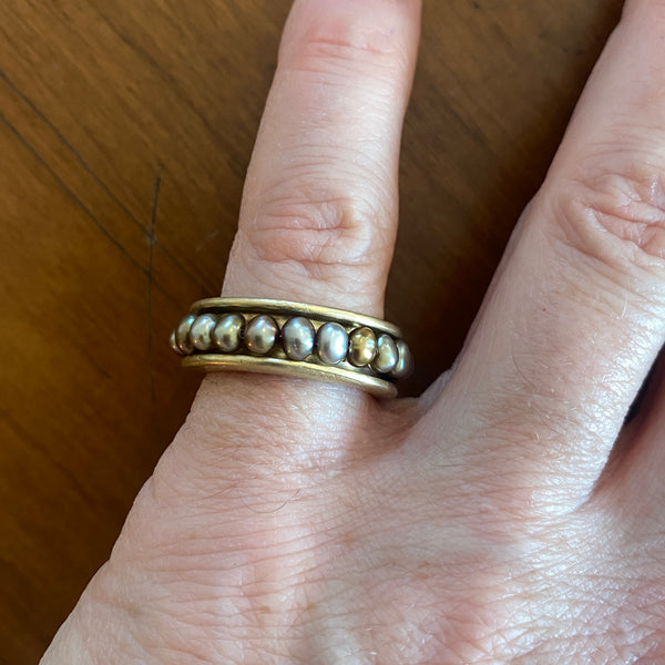 gold pearl and brass eternity ring