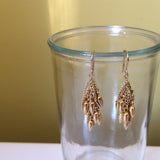 Gold-plated Bullet Cluster earrings designed by Jessica Rose