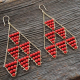 Limited edition coral large Circus earrings by Estyn Hulbert