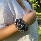 Model wearing silver/blue pearl Chaos Cuff