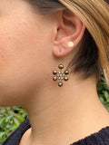 Model wearing beige and brown pearl small Kilim earrings